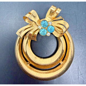 Coro Signed Vintage Gold Tone Bow Wreath Blue Rhinestone Pendant
